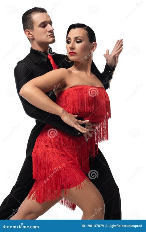 Coppia di ballerini di salsa che si guardano intensamente