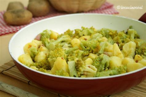 Immagine di broccoli e patate cotti in padella