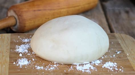 Processo di preparazione di un impasto senza glutine