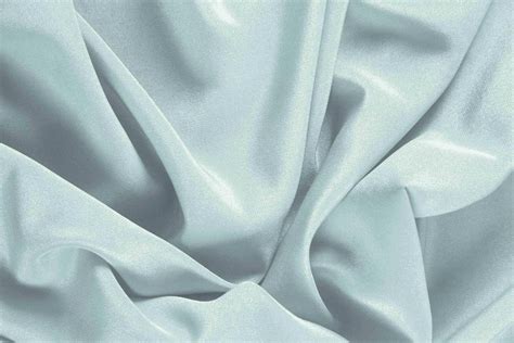 Tessuto crepe de chine di seta blu con stampa geometrica