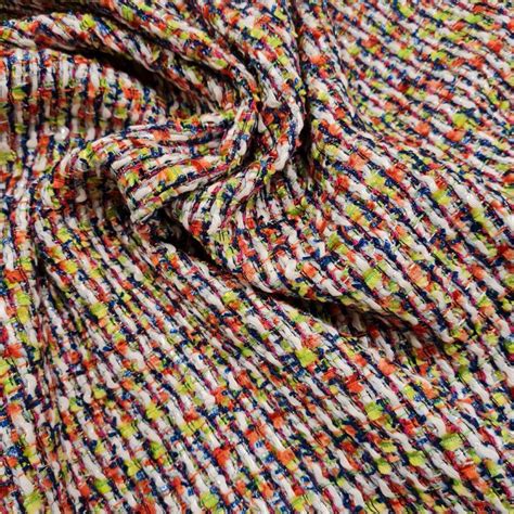 Tessuto bouclè con trama visibile