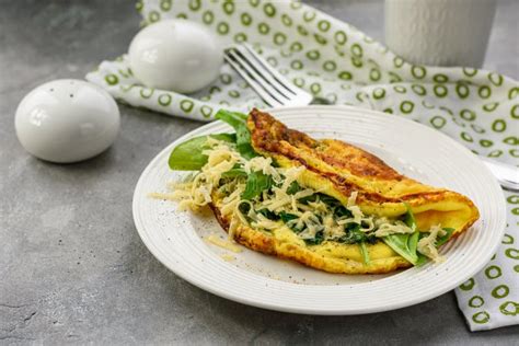 Omelette con spinaci e formaggio