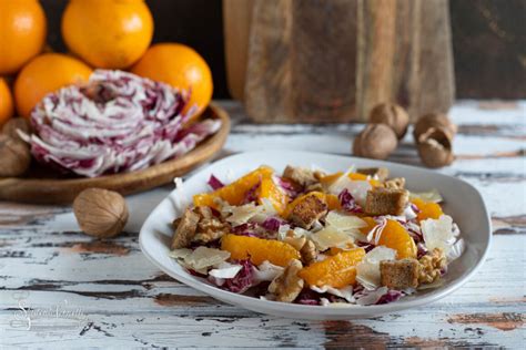 formaggio stagionato con composta di radicchio e arance