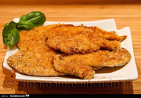 Impiattamento di fettine panate con contorno