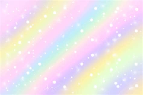 Diverse tonalità di maglioncini pastello disposti in un arcobaleno