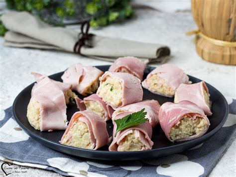 Ingredienti per gli involtini: prosciutto cotto, formaggio fresco spalmabile, olive