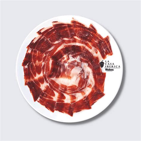 Immagine di un prodotto a base di maiale iberico, come un prosciutto affettato