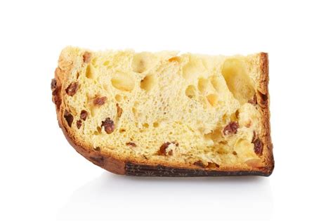 Immagine di una fetta di panettone farcito servita su un piattino con forchetta