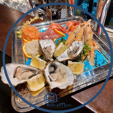 Vassoio di pesce crudo misto con gamberi, scampi e ostriche