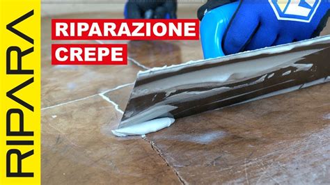 Tecnico che ripara una crepa