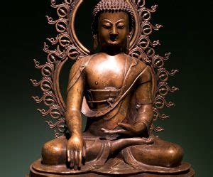 Buddha seduto che tocca la terra (Bhumisparsha Mudra)