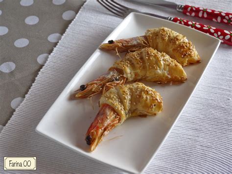 Mazzancolle avvolte in pasta sfoglia e pancetta