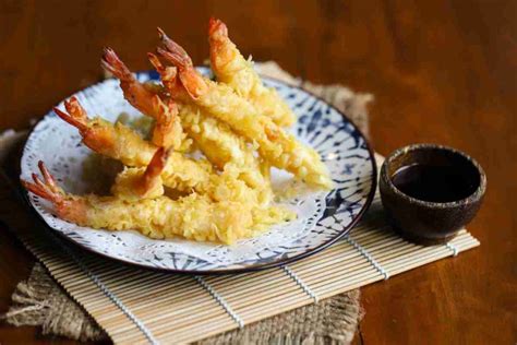 Mazzancolle in tempura su letto di riso