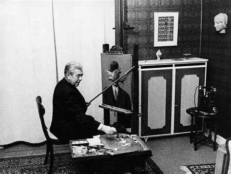 René Magritte in studio