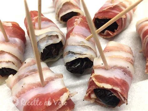 Prugne secche e pancetta a fette