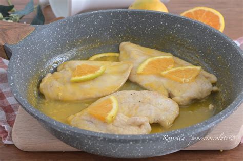 Piatto di pollo alla griglia con salsa all'arancia