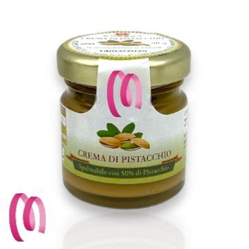 Vasetto di crema di pistacchio con un cucchiaino